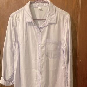Light lavendar button up long sleeve blouse.
